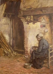 Alte Frau schält Kartoffeln